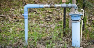 close-up-metal-pipe-field