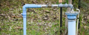 close-up-metal-pipe-field